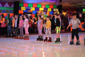 kids having fun roller skating